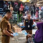 PJ Jasa Raharja Samsat Sukadana dan UPTD Wilayah IV Gencarkan Sosialisasi Program Keringanan Pajak di Pasar Tri Datu